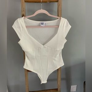 Princess Polly white bodysuit never worn, no tags, size 6
